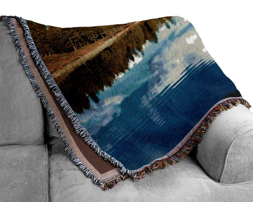 ripples in the ocean view Woven Blanket