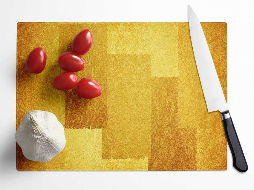 Rollers of yellow paint Glass Chopping Board