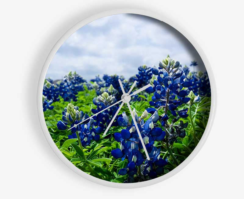 Bue flowers on green stems Clock - Wallart-Direct UK