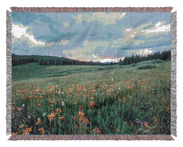 Spring meadow between the trees Woven Blanket