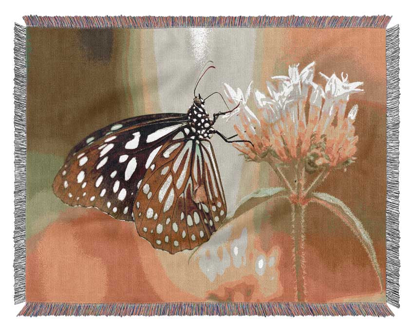 Butterfly feeding time Woven Blanket