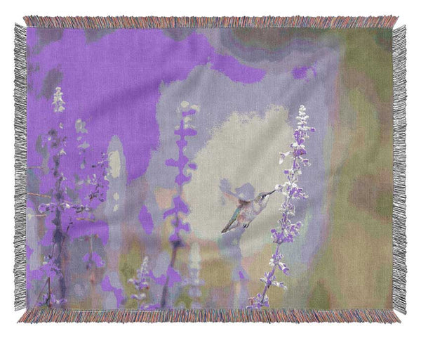 Humming bird feeding time Woven Blanket