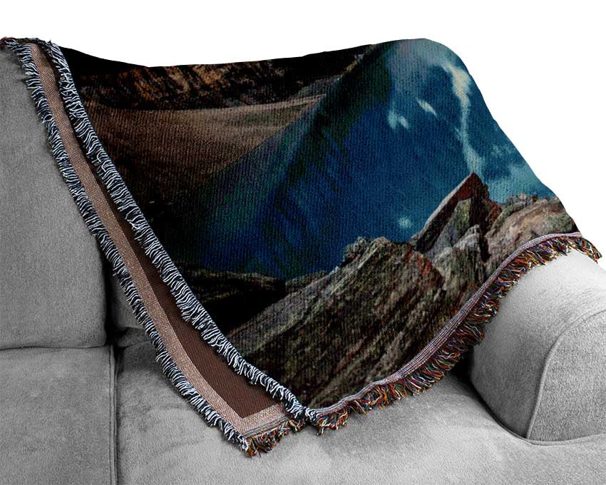 Crystal clear lake in the mountain range Woven Blanket