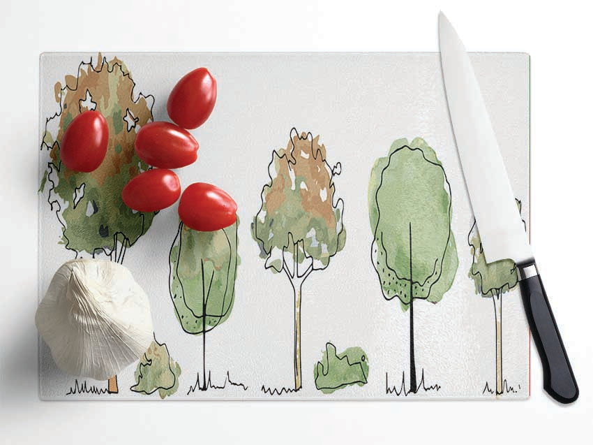 Five Trees In A Row Glass Chopping Board